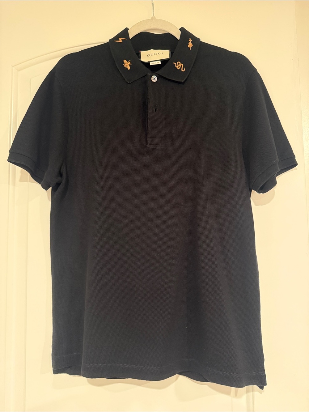 Gucci Black Polo with Gold Embroidered Collar Motifs
